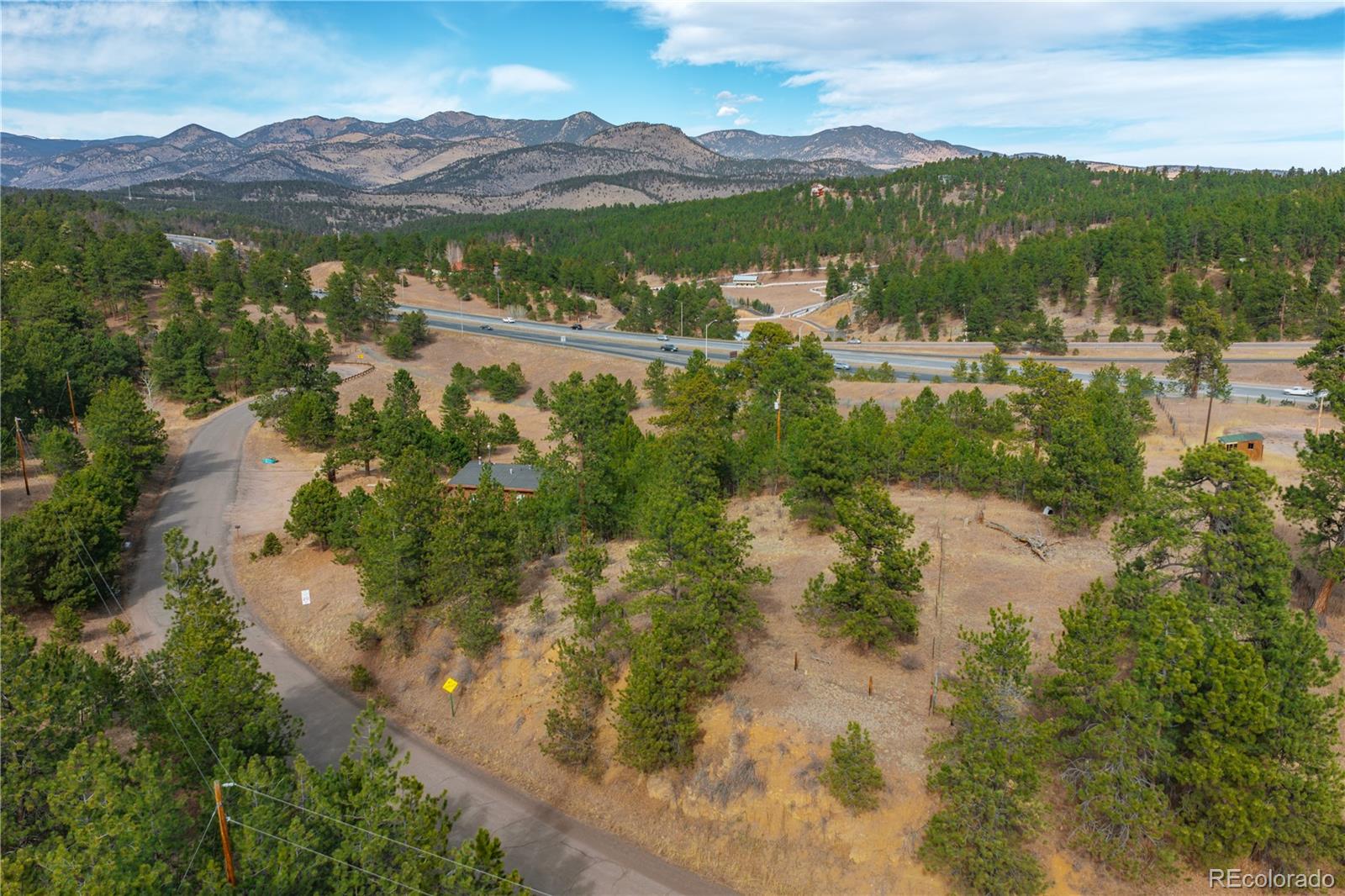 29793 Ruby Ranch Road Evergreen, CO 80439 - Photo 33 of 39 a view of lake with mountain