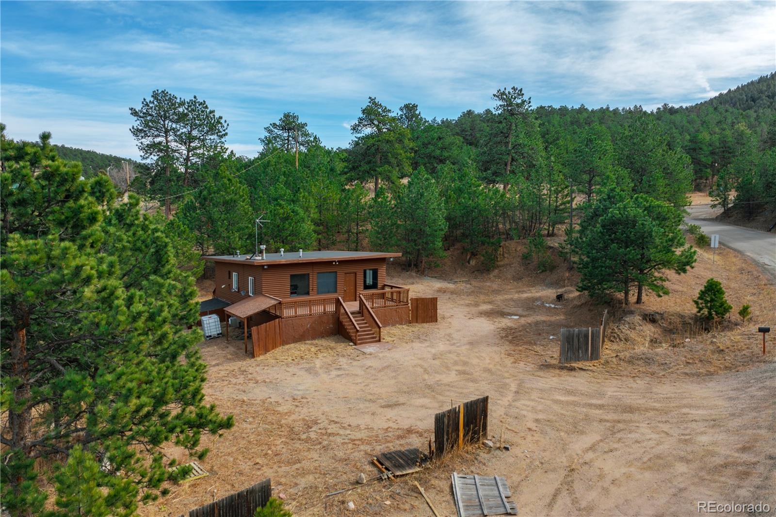 29793 Ruby Ranch Road Evergreen, CO 80439 - Photo 37 of 39 an outdoor space with patio