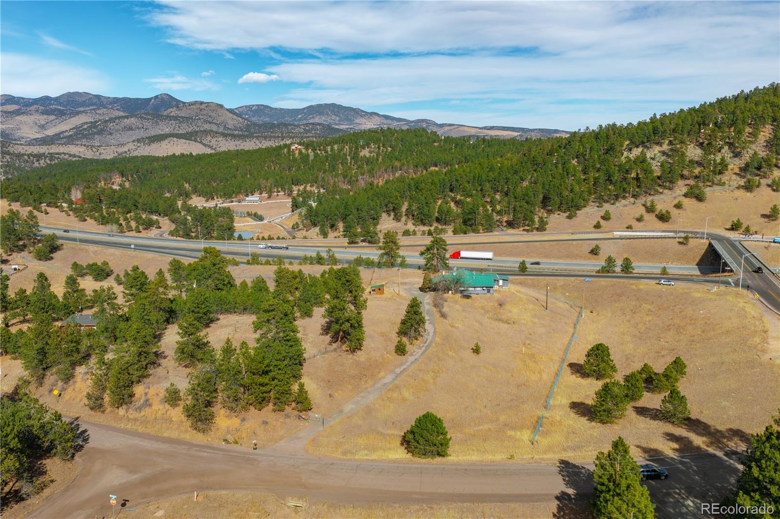 29793 Ruby Ranch Road Evergreen, CO 80439 - Photo 10 of 39 a view of lake with mountain
