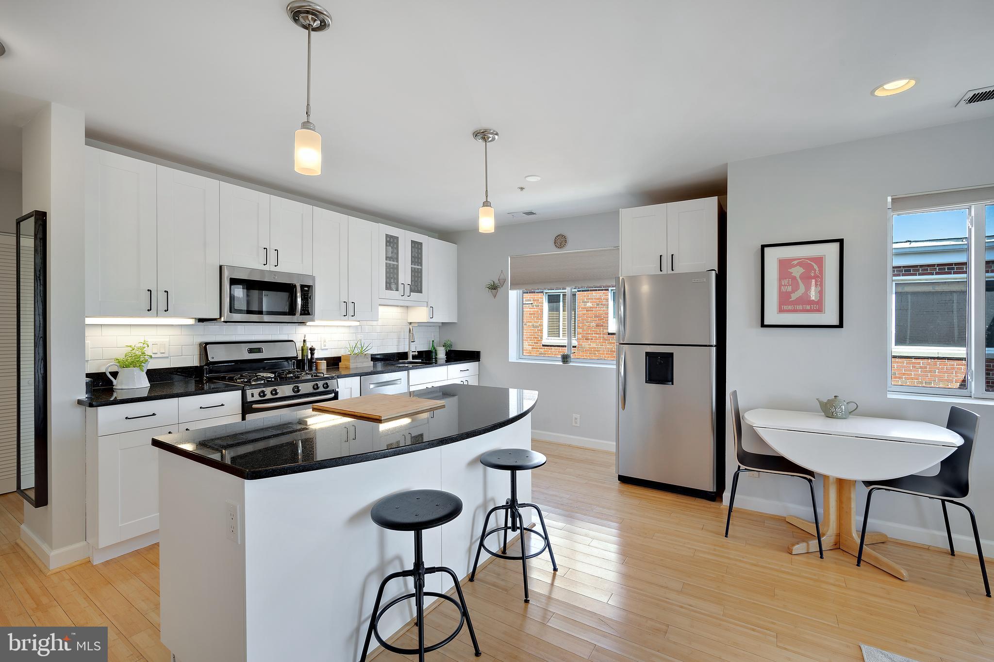 1956 3rd Street Northeast, Unit 4 Washington, DC 20002 - Photo 6 of 15 Updated kitchen w/ spacious island