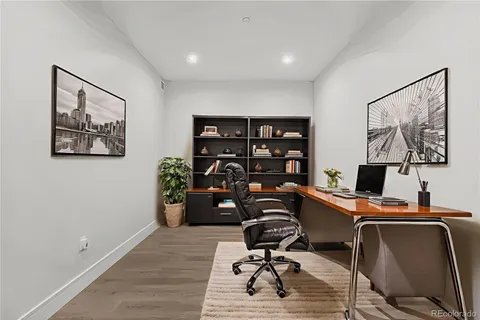 a view of kitchen with wooden floor