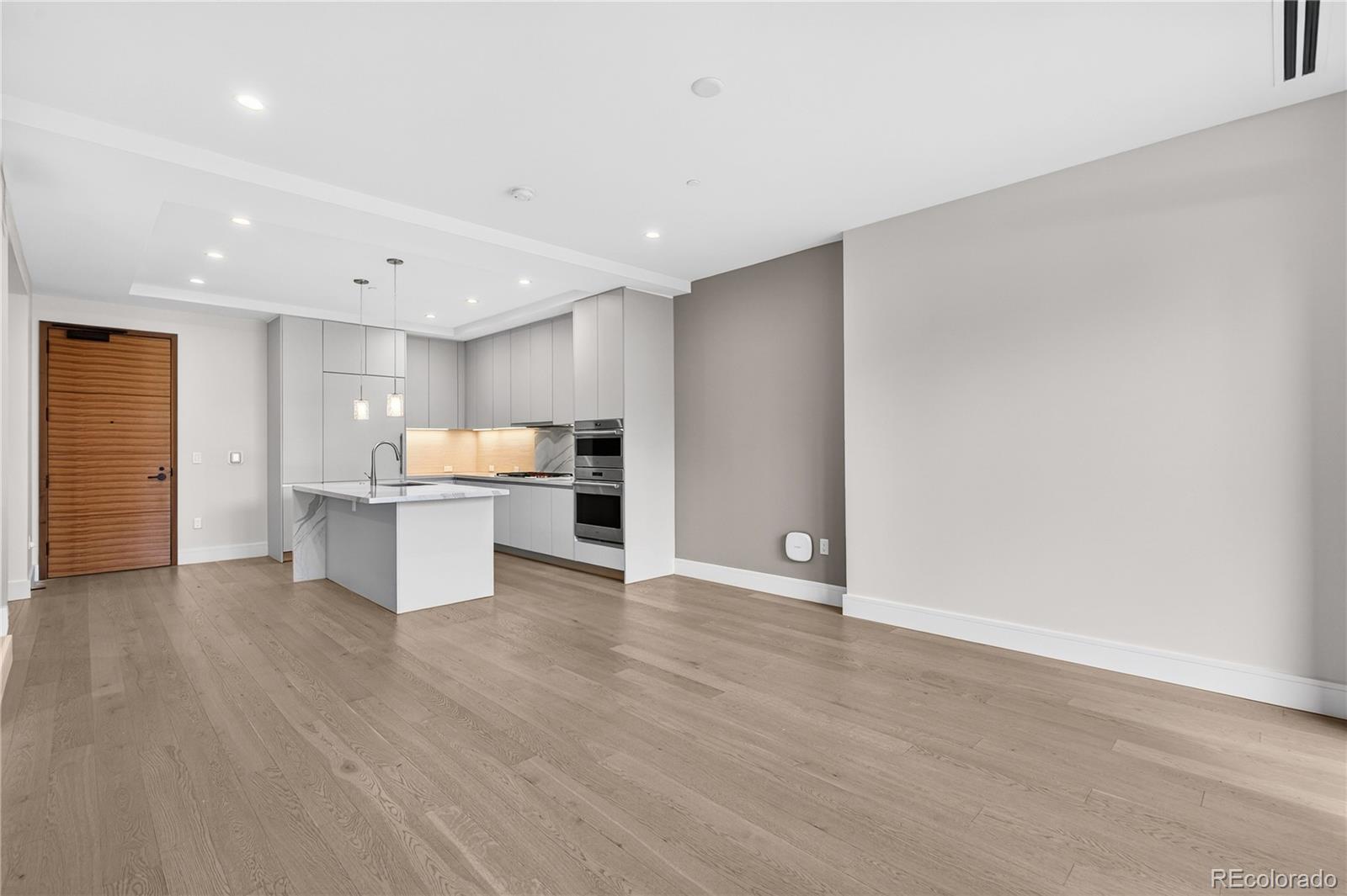 1901 Wazee Street, Unit 515 Denver, CO 80202 - Photo 23 of 46 a view of kitchen with wooden floor