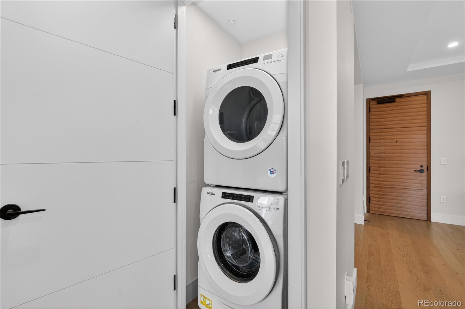 1901 Wazee Street, Unit 515 Denver, CO 80202 - Photo 26 of 46 a utility room with dryer and washer