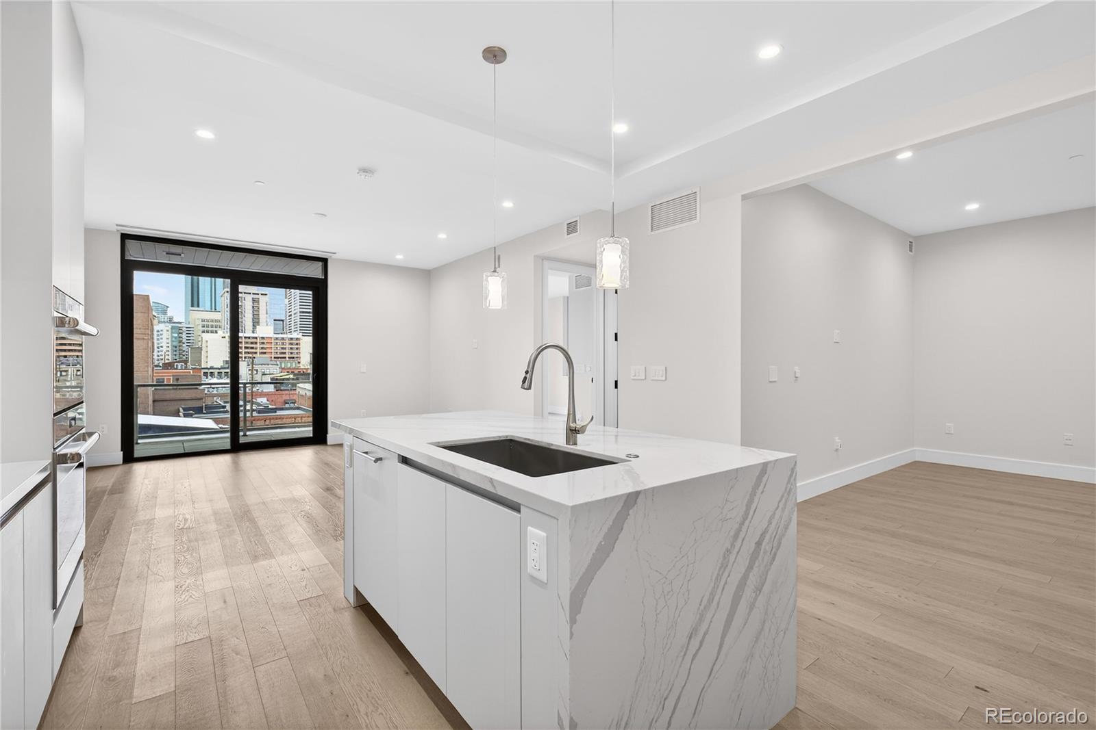 1901 Wazee Street, Unit 515 Denver, CO 80202 - Photo 9 of 46 a kitchen with sink and window