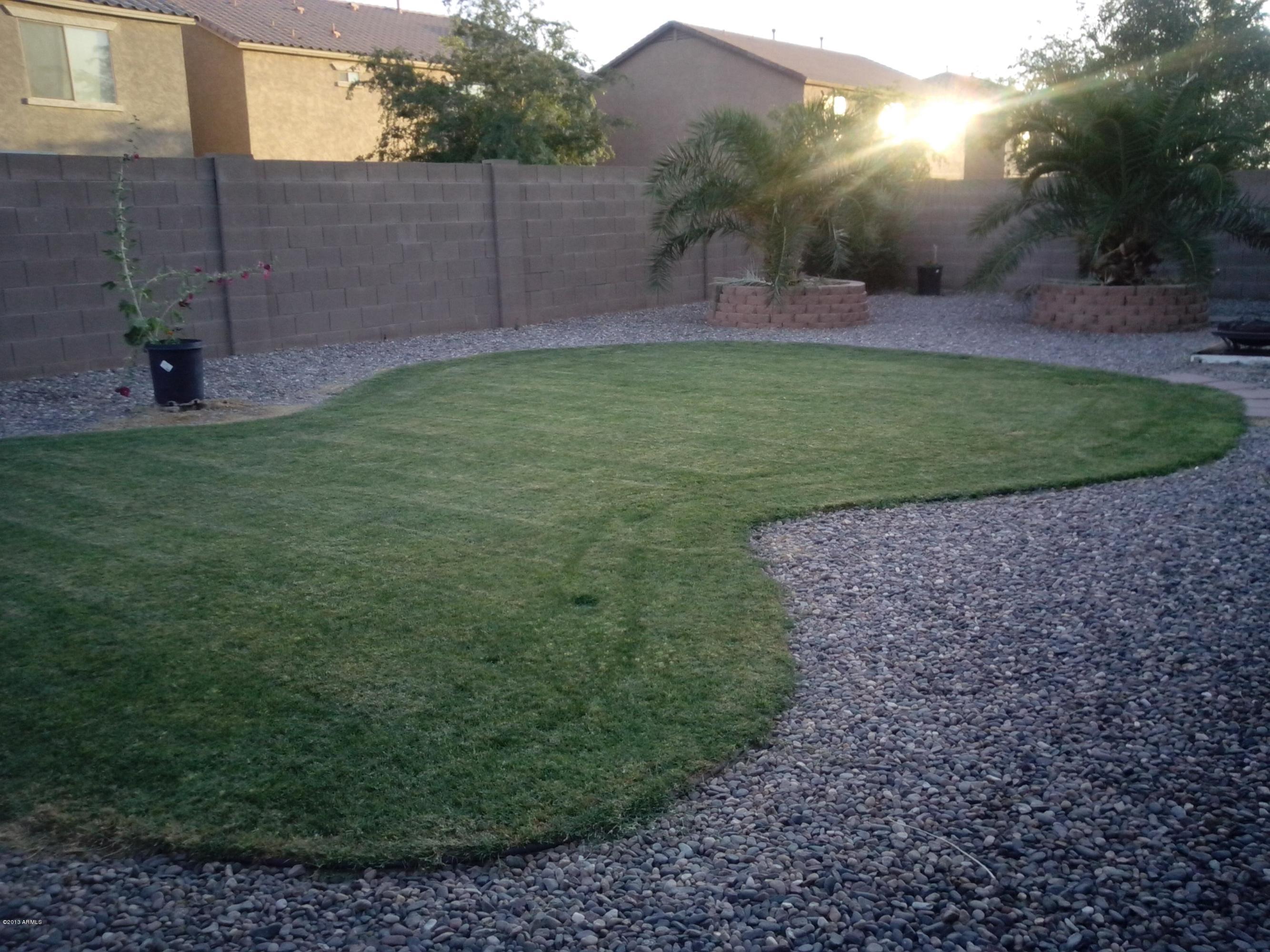 9427 West Monte Vista Road Phoenix, AZ 85037 - Photo 13 of 13 a view of a garden