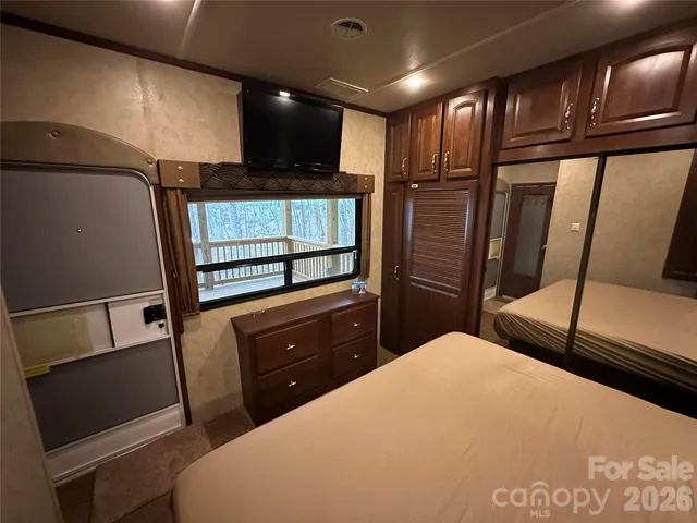 a kitchen with a refrigerator and a sink