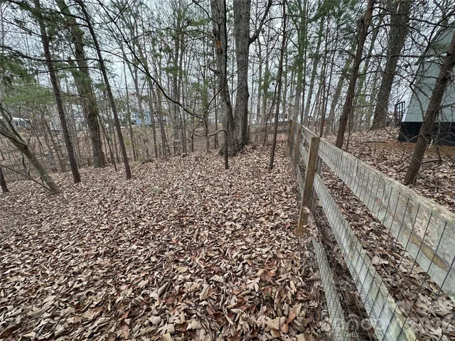 a view of a pathway with a bench
