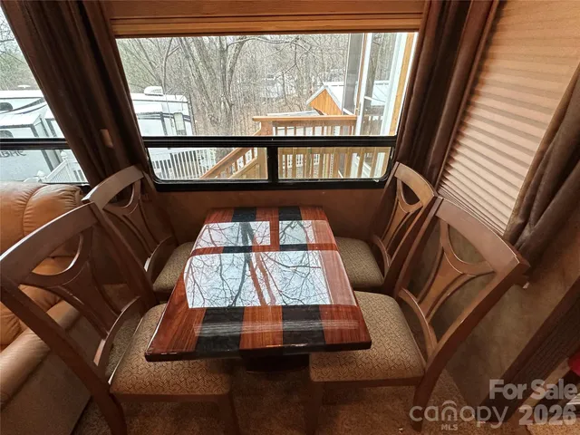 a view of sitting area with furniture and window