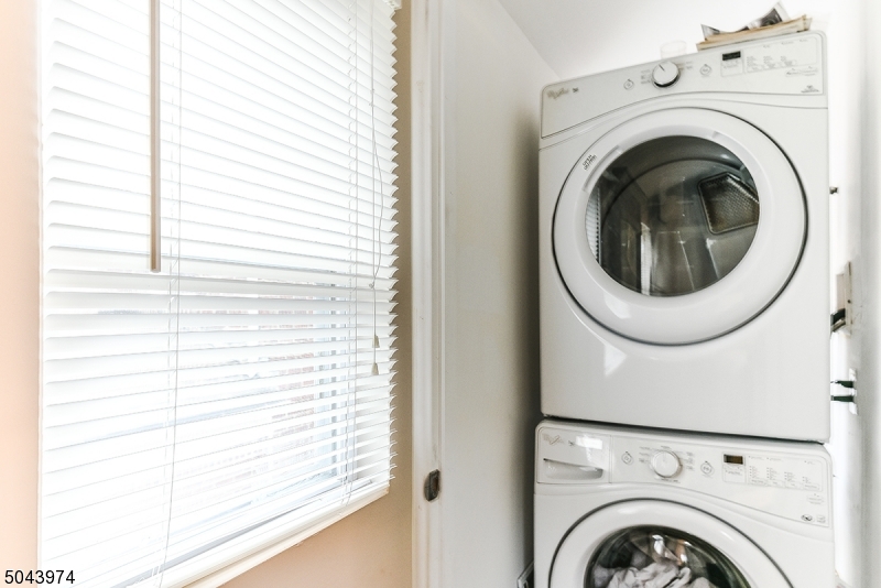 72 Rector Street Millburn, NJ 07041 - Photo 14 of 14 a view of entryway with washer and dryer