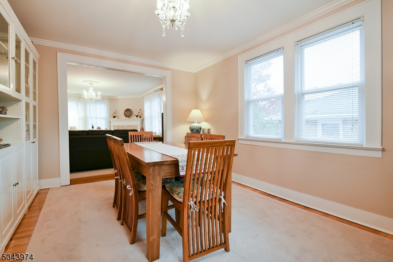 72 Rector Street Millburn, NJ 07041 - Photo 4 of 14 a view of a dining room with furniture and chandelier