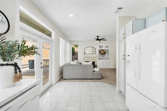a spacious bathroom with a tub shower and mirror