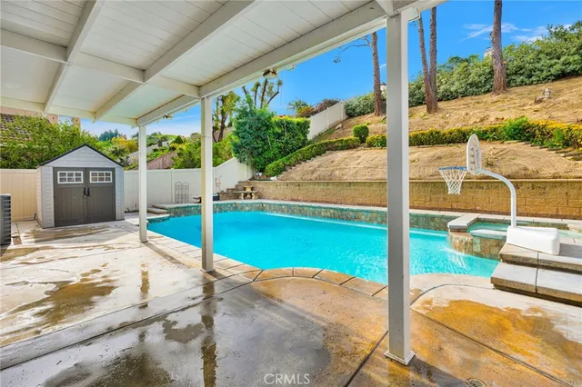 a house view with a backyard space