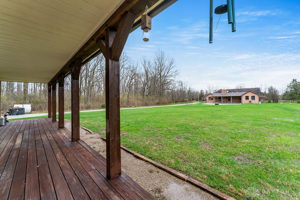 7400 Cook-Jones Road Waynesville, OH 45068 - Photo 67 of 72 This expansive outdoor space offers a blend of natural beauty and comfortable living.