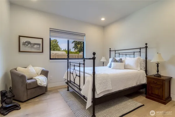 a bed room with a bed and a couch
