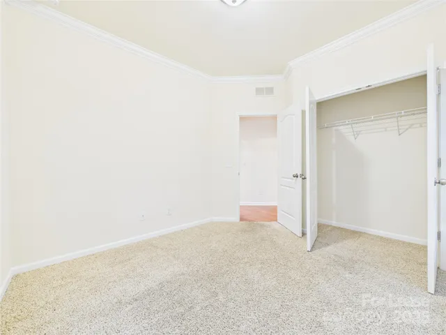 a view of a bathroom with a sink and a mirror