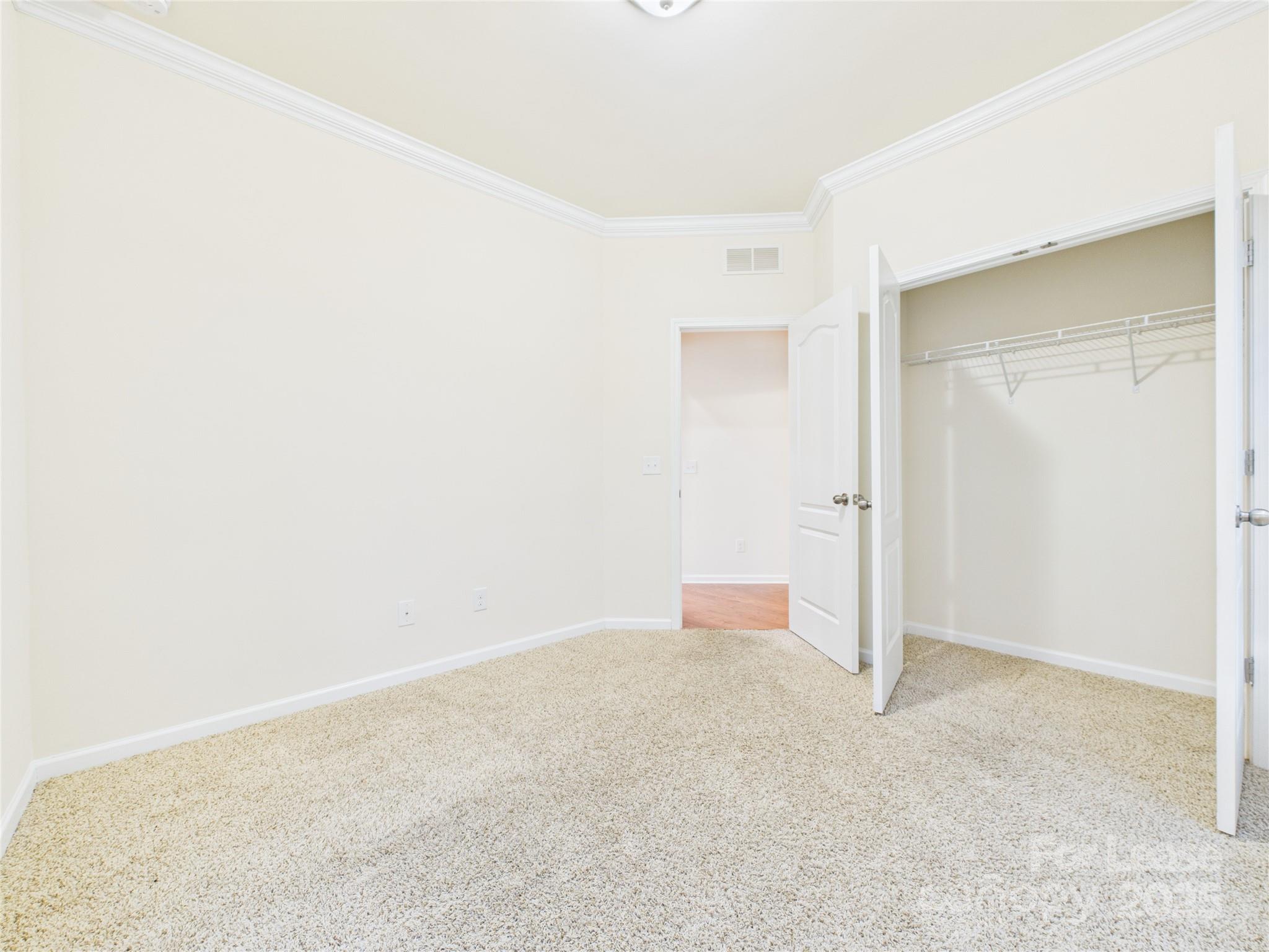 1249 Reflection Avenue Northwest Concord, NC 28027 - Photo 18 of 25 a view of an empty room