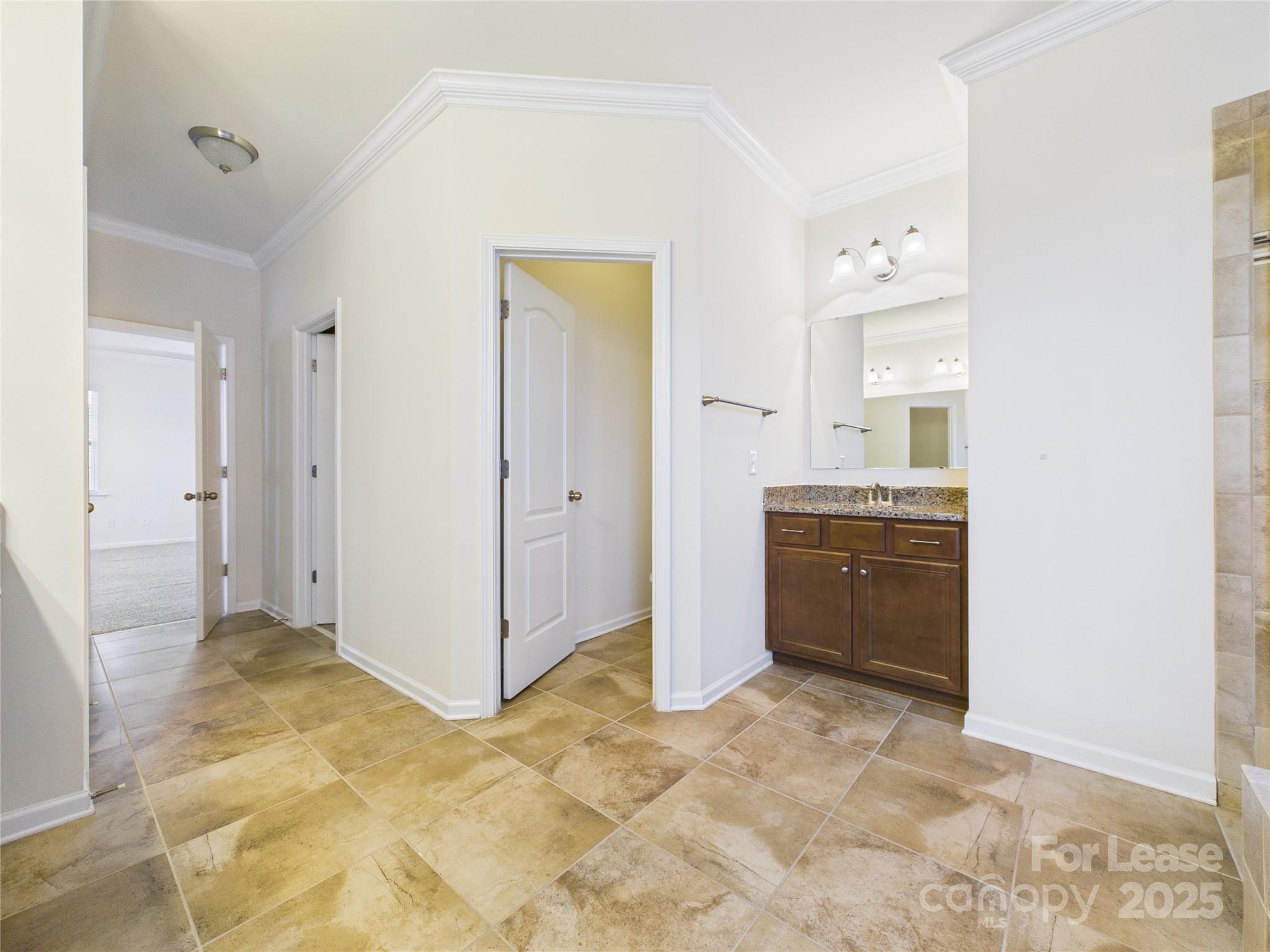 1249 Reflection Avenue Northwest Concord, NC 28027 - Photo 19 of 25 a view of a bathroom with a sink and a mirror