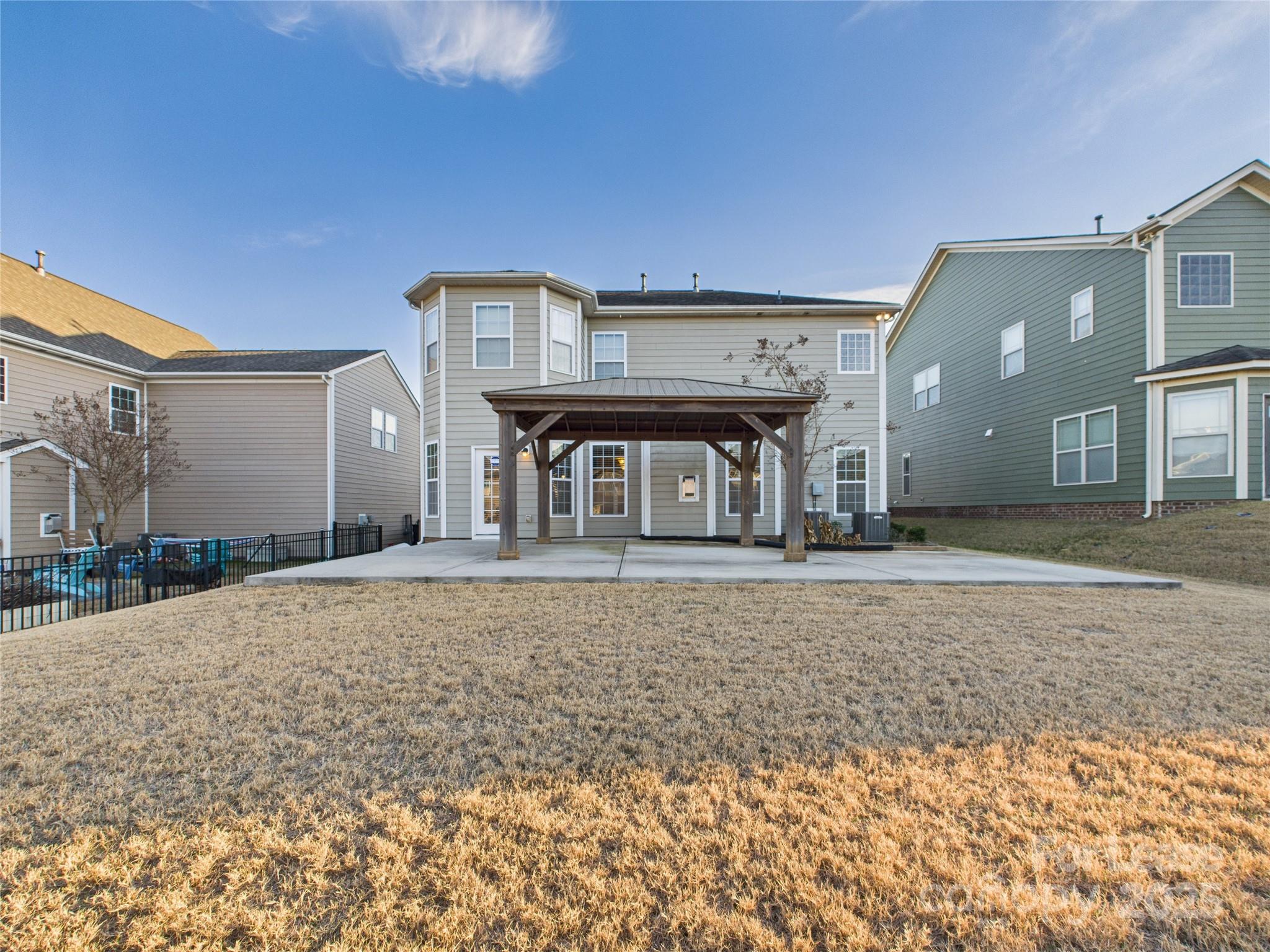 1249 Reflection Avenue Northwest Concord, NC 28027 - Photo 24 of 25 a front view of a house with garden