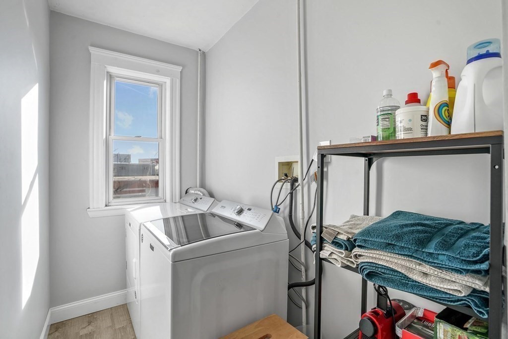 12 Clover Street, Unit 2 Boston, MA 02122 - Photo 10 of 13 a utility room with dryer and washer