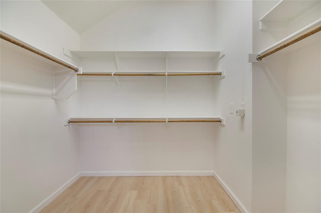 549 Hickory Lane Fate, TX 75087 - Photo 16 of 22 a view of an empty walk in closet