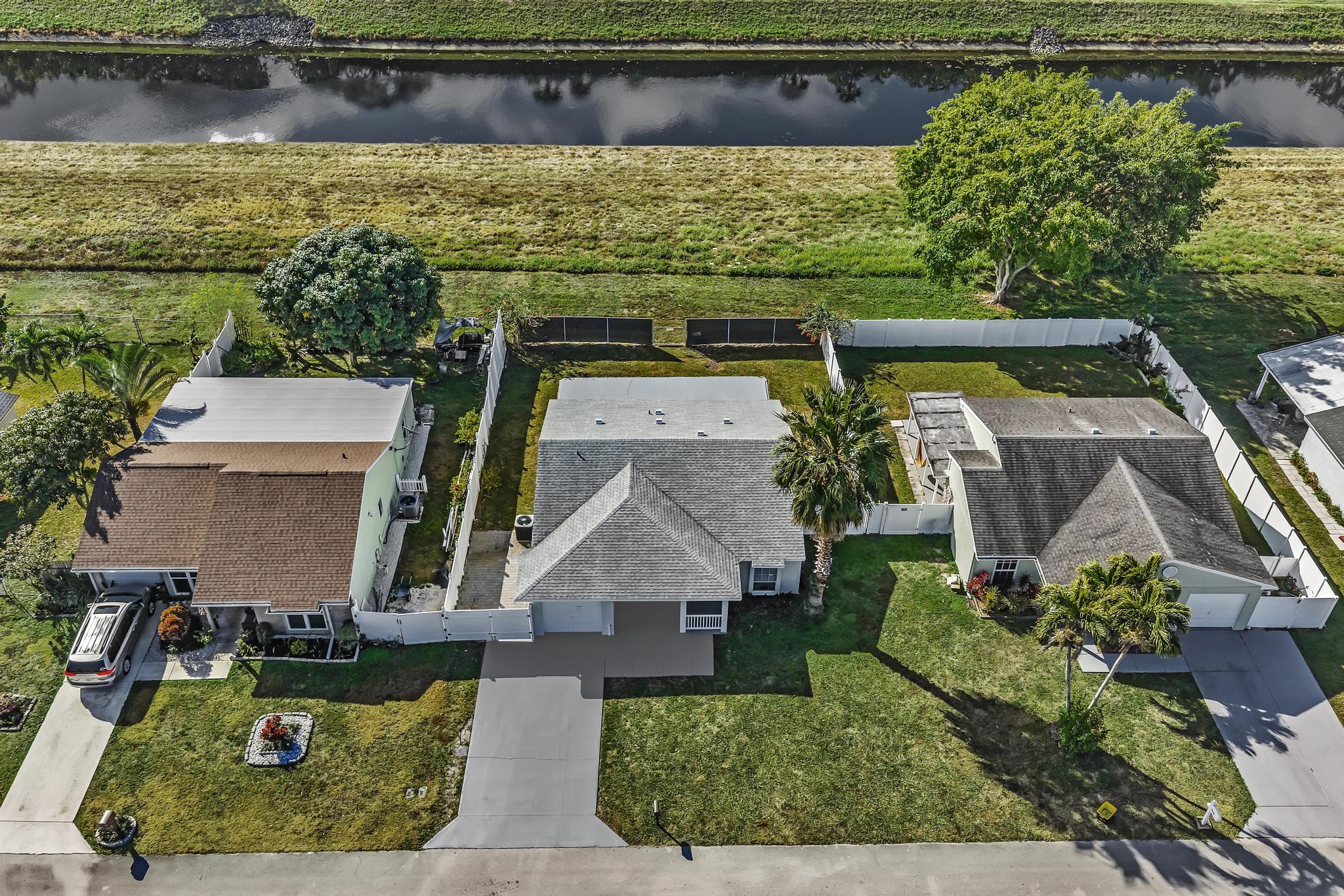 8316 Huntsman Place Boca Raton, FL 33433 - Photo 3 of 52 DJI_20260208100512_0032_D