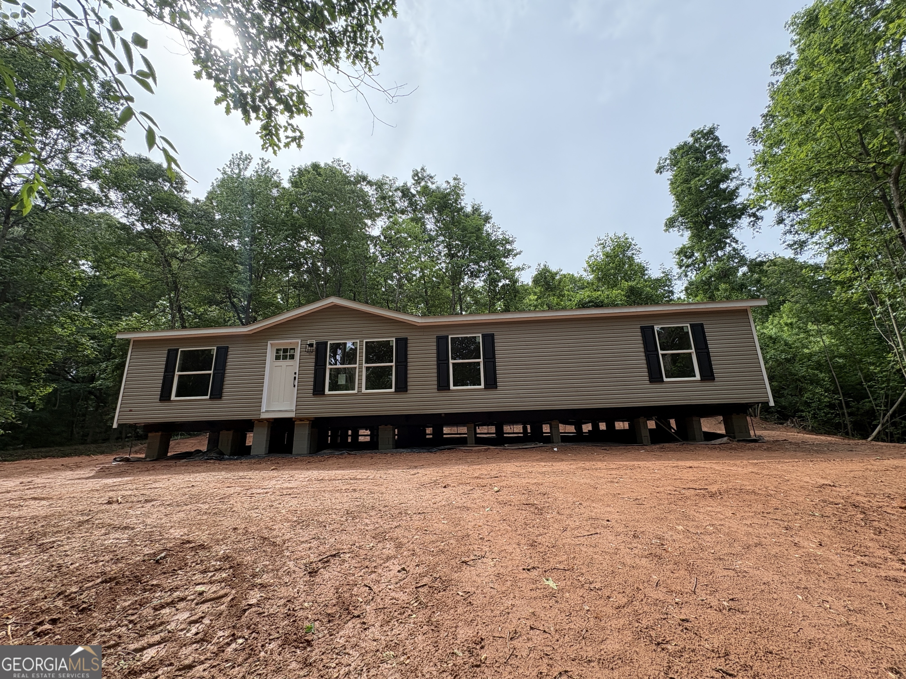 1020 Neal Road Commerce, GA 30530 - Photo 1 of 25 a front view of a house with a yard