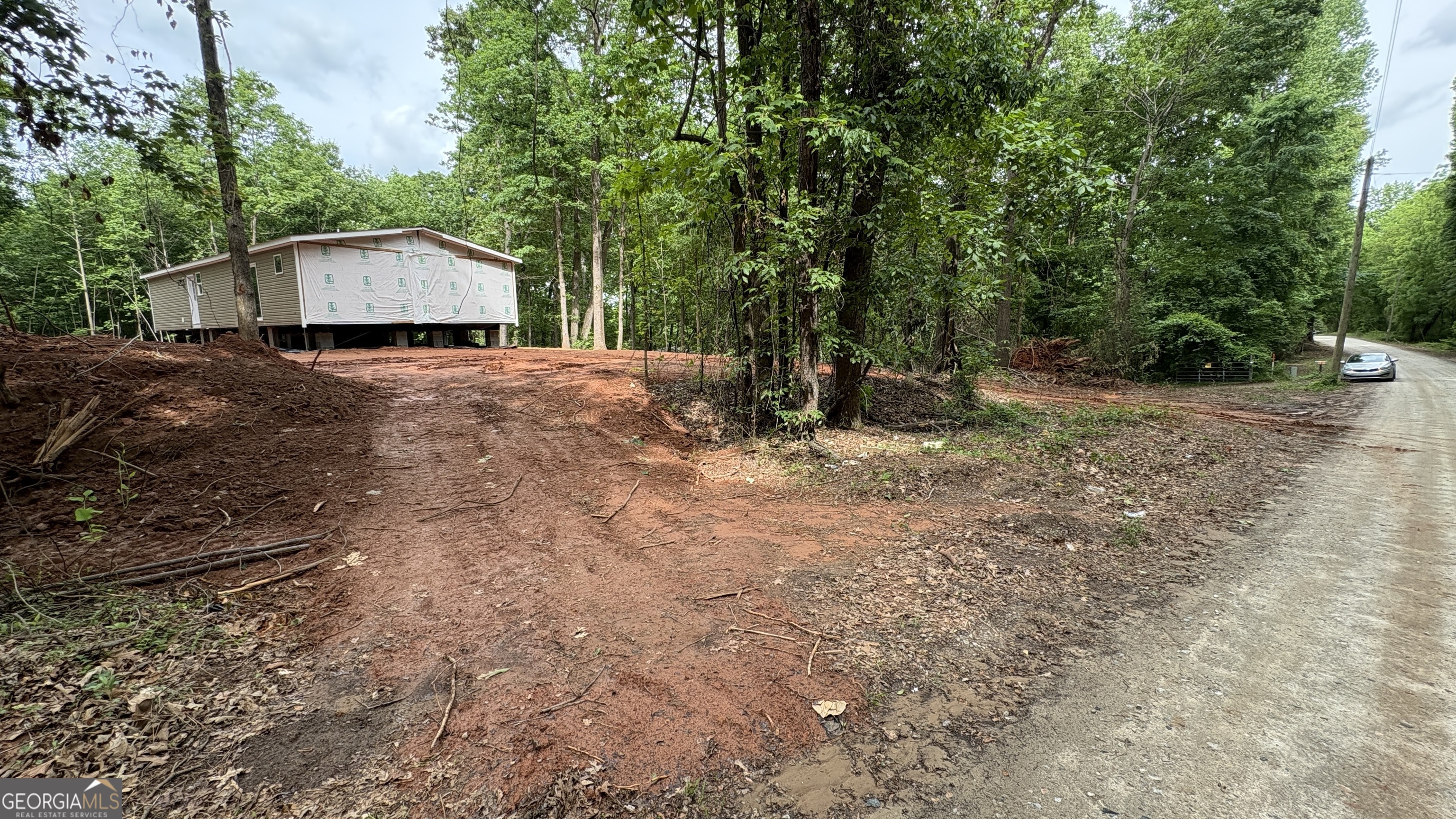 1020 Neal Road Commerce, GA 30530 - Photo 14 of 25 a house view with a backyard space