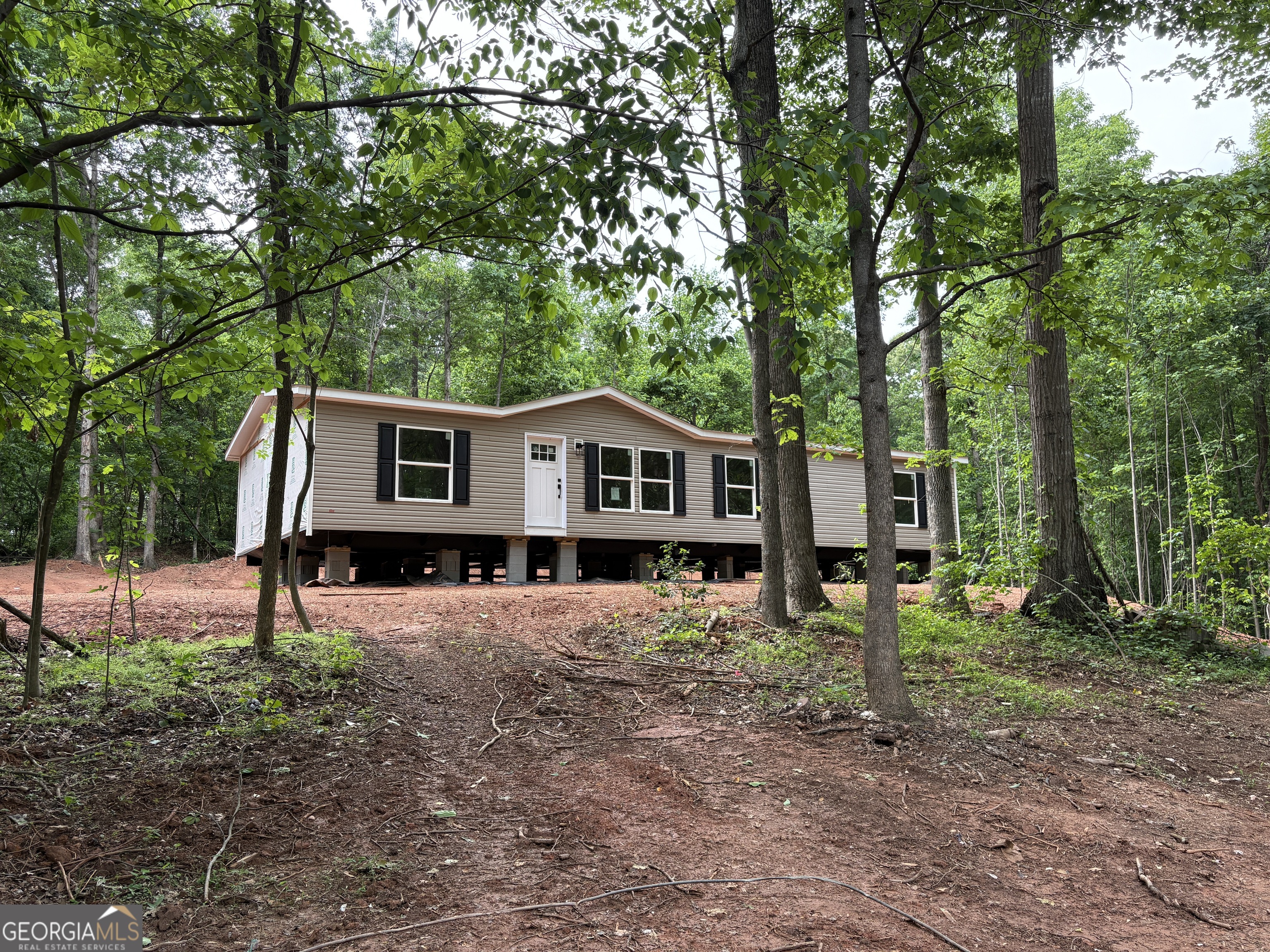 1020 Neal Road Commerce, GA 30530 - Photo 16 of 25 a view of a house with a yard