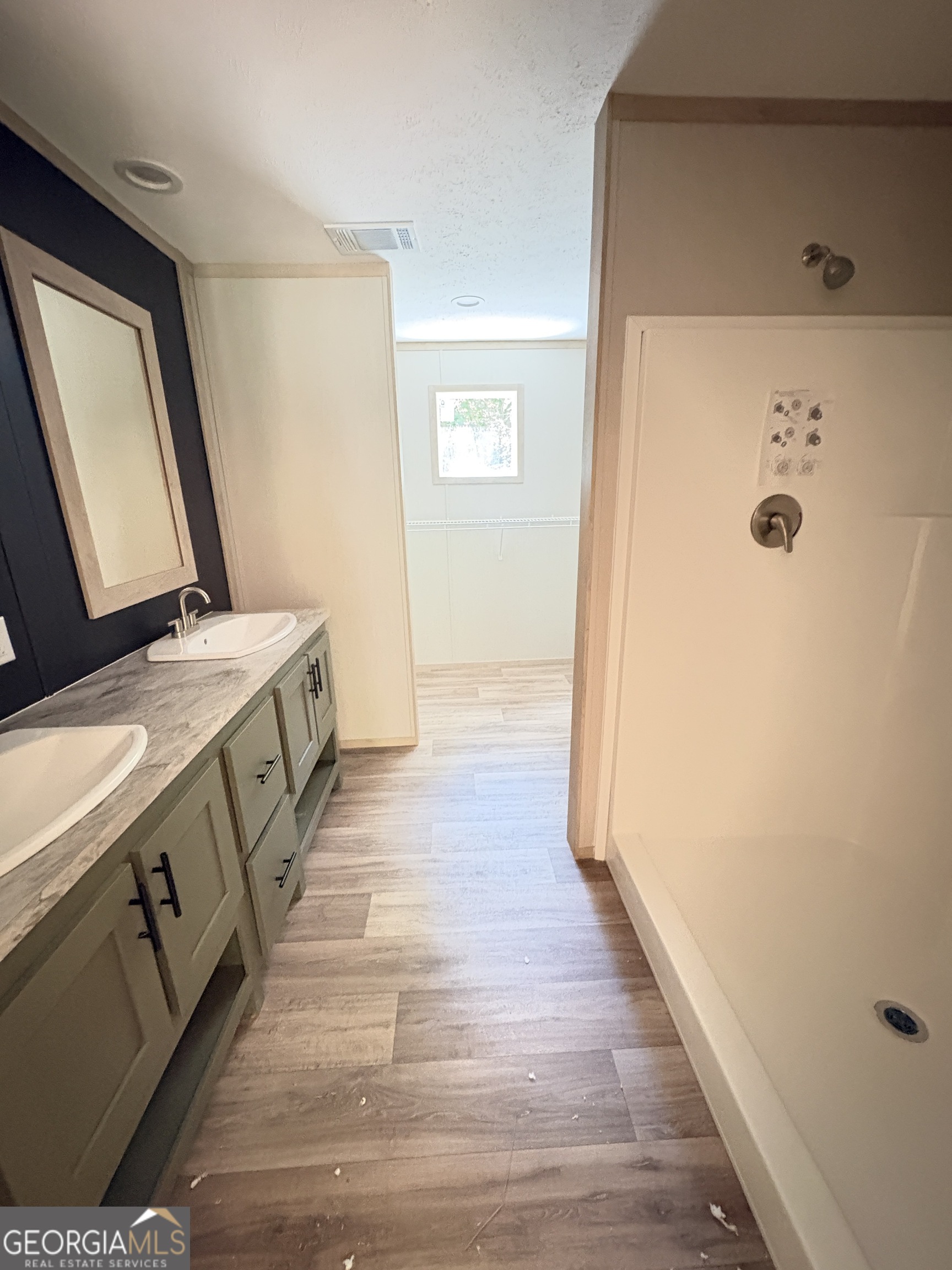 1020 Neal Road Commerce, GA 30530 - Photo 17 of 25 a view of a hallway with wooden floor