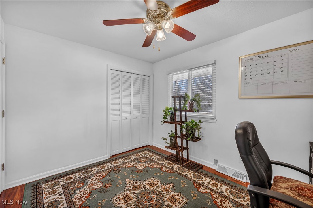 475 Harris Road Cleveland, OH 44143 - Photo 32 of 38 Office space featuring ceiling fan, wood finished floors, visible vents, and baseboards