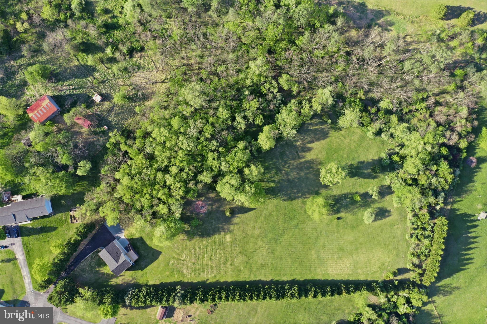 174 Open Field Lane Falling Waters, WV 25419 - Photo 46 of 56 Semi- level, private lot w/ mature trees