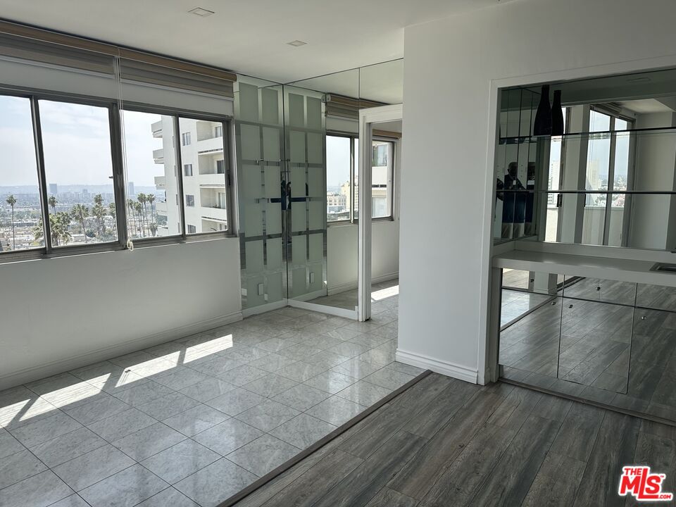 7250 Franklin Avenue, Unit 702 Los Angeles, CA 90046 - Photo 18 of 39 a view of a room that has a large window