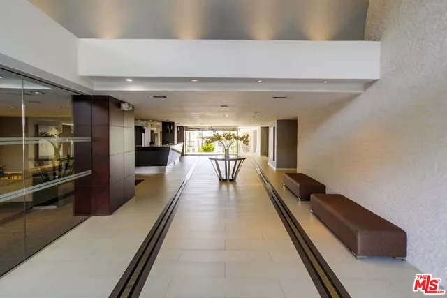 a lobby with furniture and view