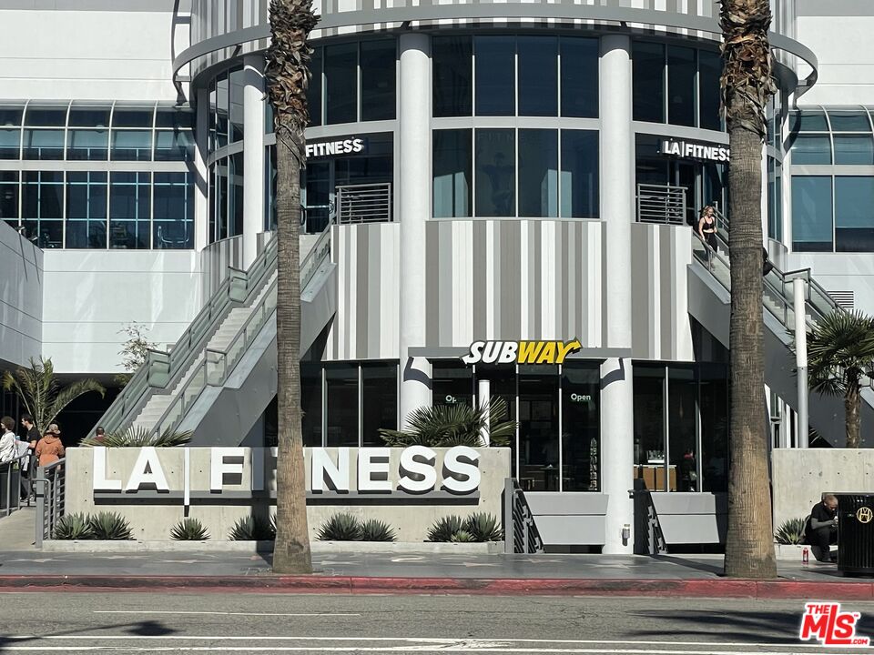 7250 Franklin Avenue, Unit 702 Los Angeles, CA 90046 - Photo 37 of 39 a view of a building with a street