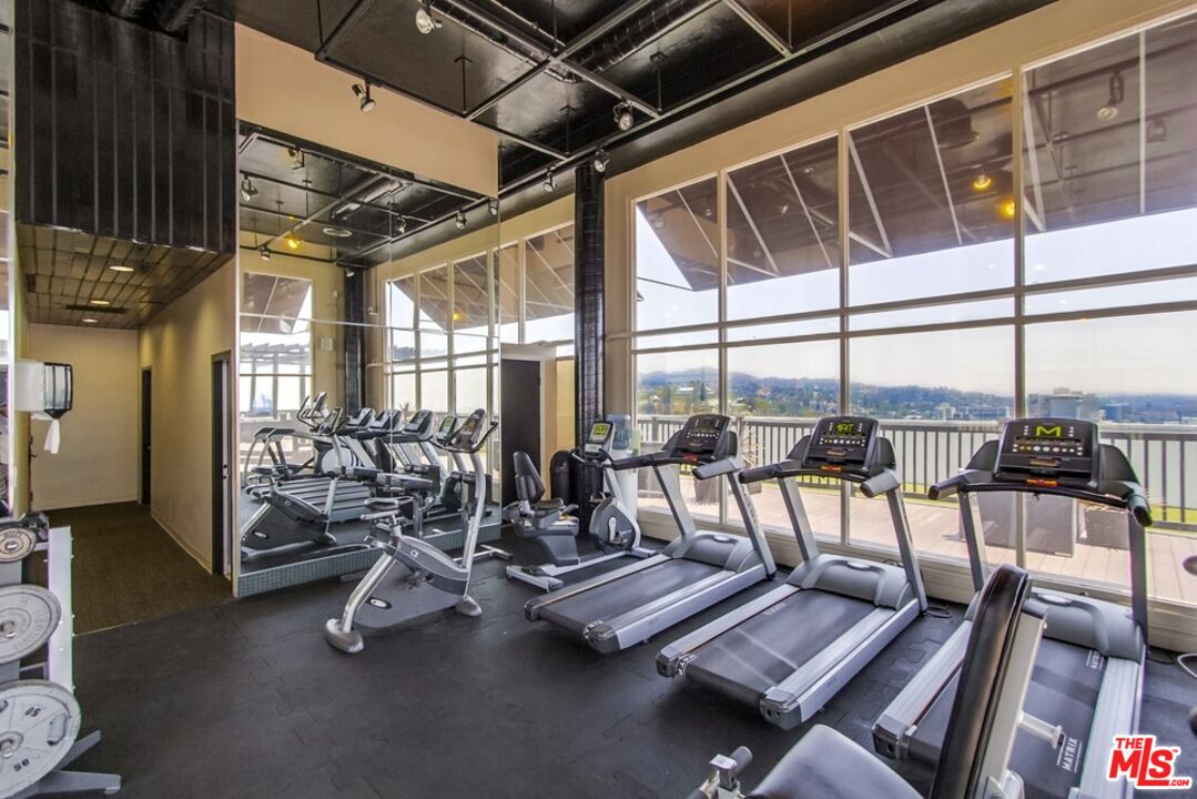 7250 Franklin Avenue, Unit 702 Los Angeles, CA 90046 - Photo 6 of 39 a view of a balcony with chairs