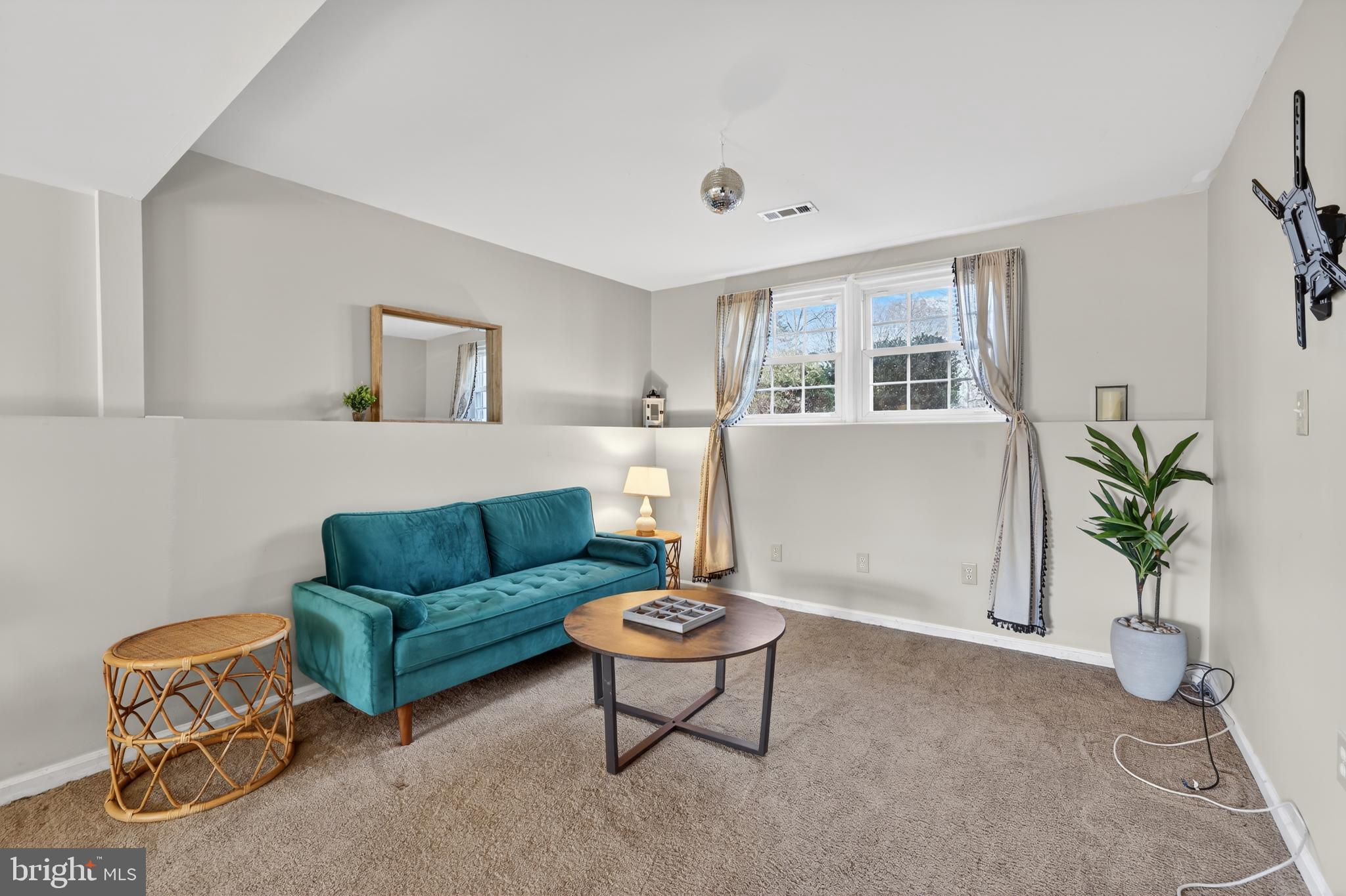 621 Holly Corner Road Fredericksburg, VA 22406 - Photo 21 of 48 Chic living space with natural light.