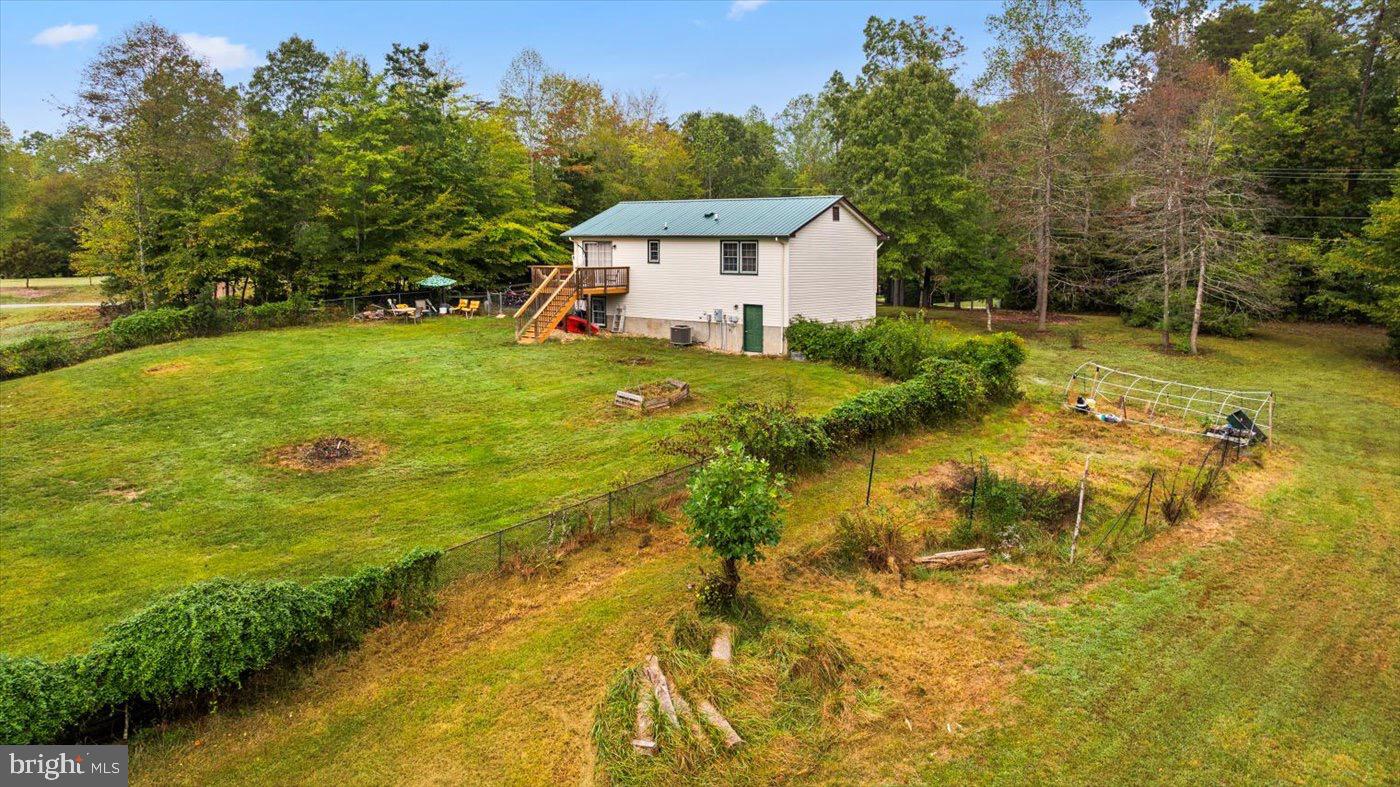 621 Holly Corner Road Fredericksburg, VA 22406 - Photo 33 of 48 Charming home nestled in lush greenery.