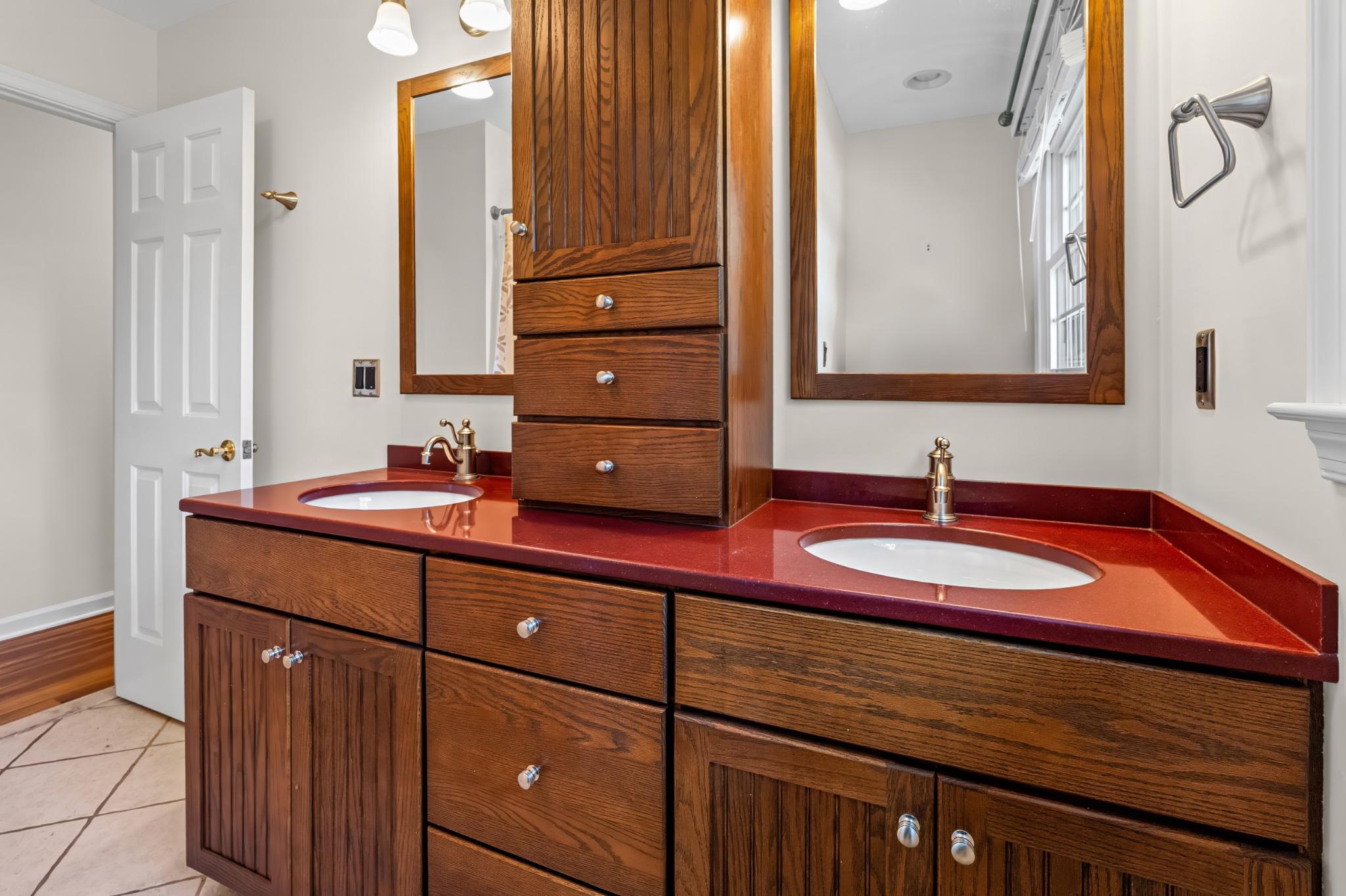 22 Pogue Avenue Rising Sun, MD 21911 - Photo 32 of 44 Elegant dual-sink bathroom oasis in the hall bath