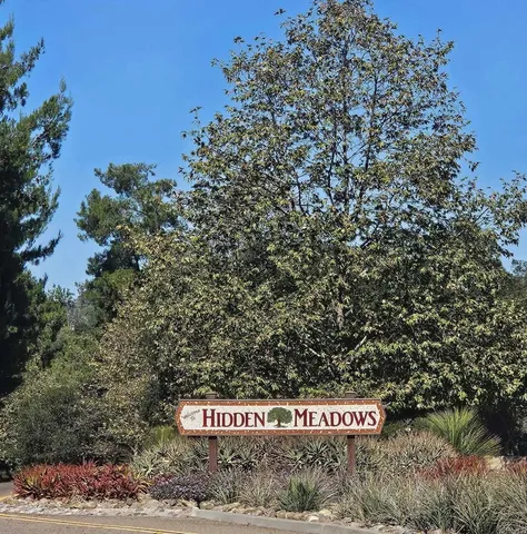 a sign that is on the side of a road