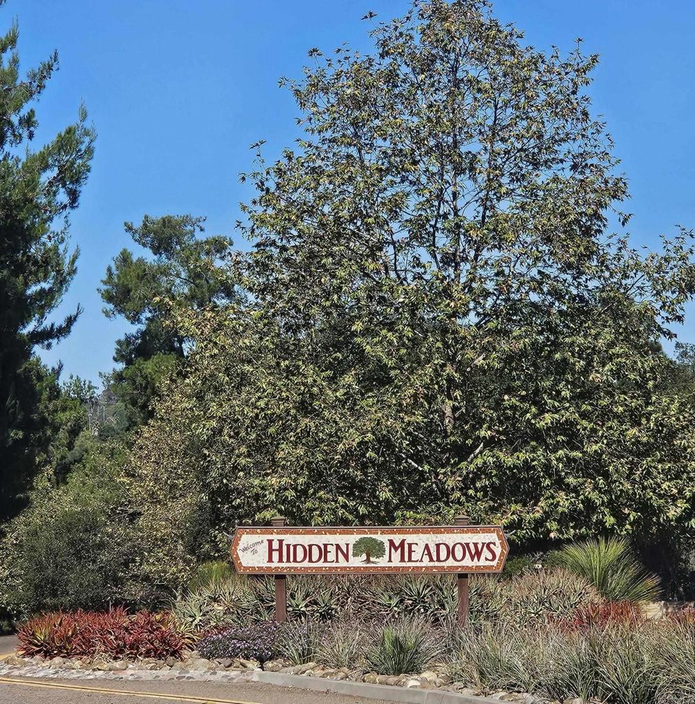 28124 Mountain Meadow Road Escondido, CA 92026 - Photo 29 of 31 a sign that is on the side of a road