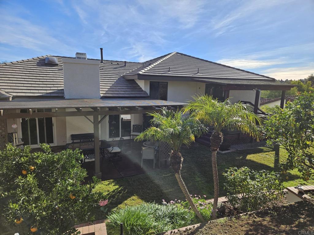 28124 Mountain Meadow Road Escondido, CA 92026 - Photo 3 of 31 front view of a house with a yard