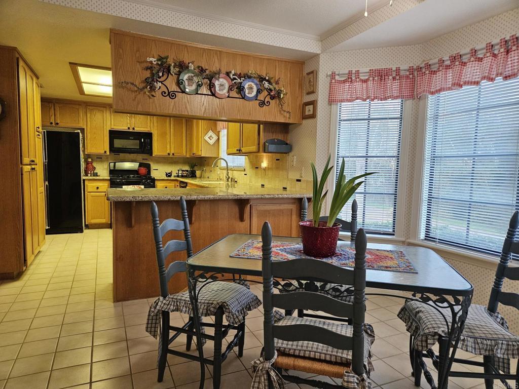 28124 Mountain Meadow Road Escondido, CA 92026 - Photo 9 of 31 a view of a dining room with furniture