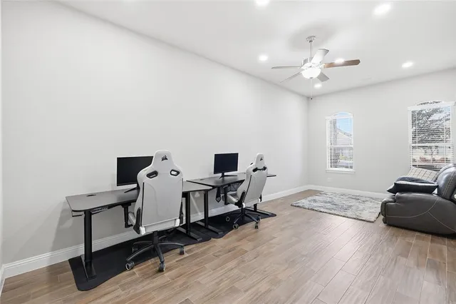 a view of a dining room with furniture and a table