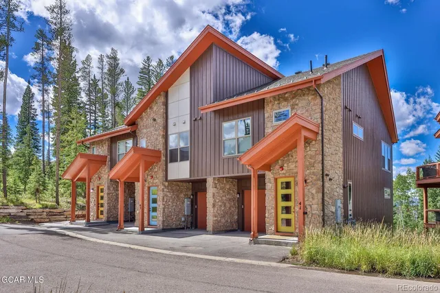 a view of a city with lots of trees