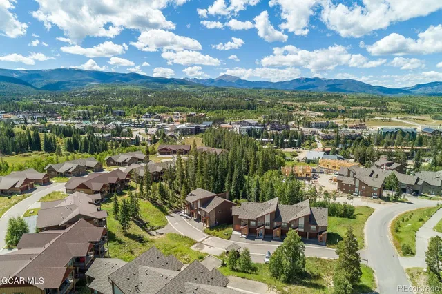 a front view of a house with a garage