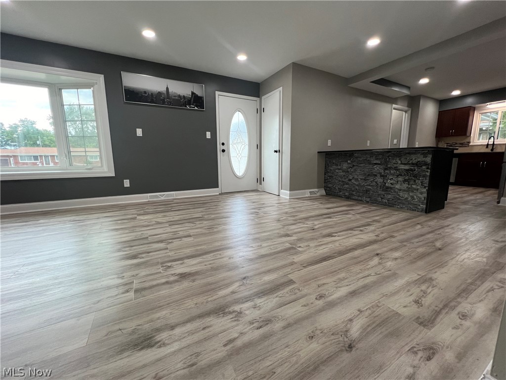 7475 Selwick Drive Parma, OH 44129 - Photo 4 of 29 Living room featuring light wood-type flooring