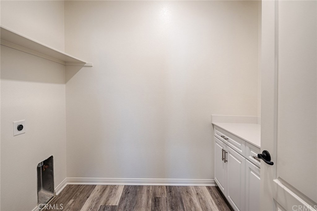 24536 Acadia Drive Corona, CA 92883 - Photo 17 of 40 a view of storage and utility room with empty racks