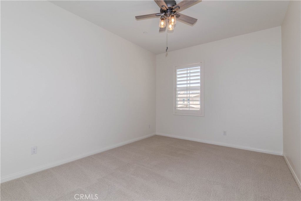 24536 Acadia Drive Corona, CA 92883 - Photo 25 of 40 an empty room with a window