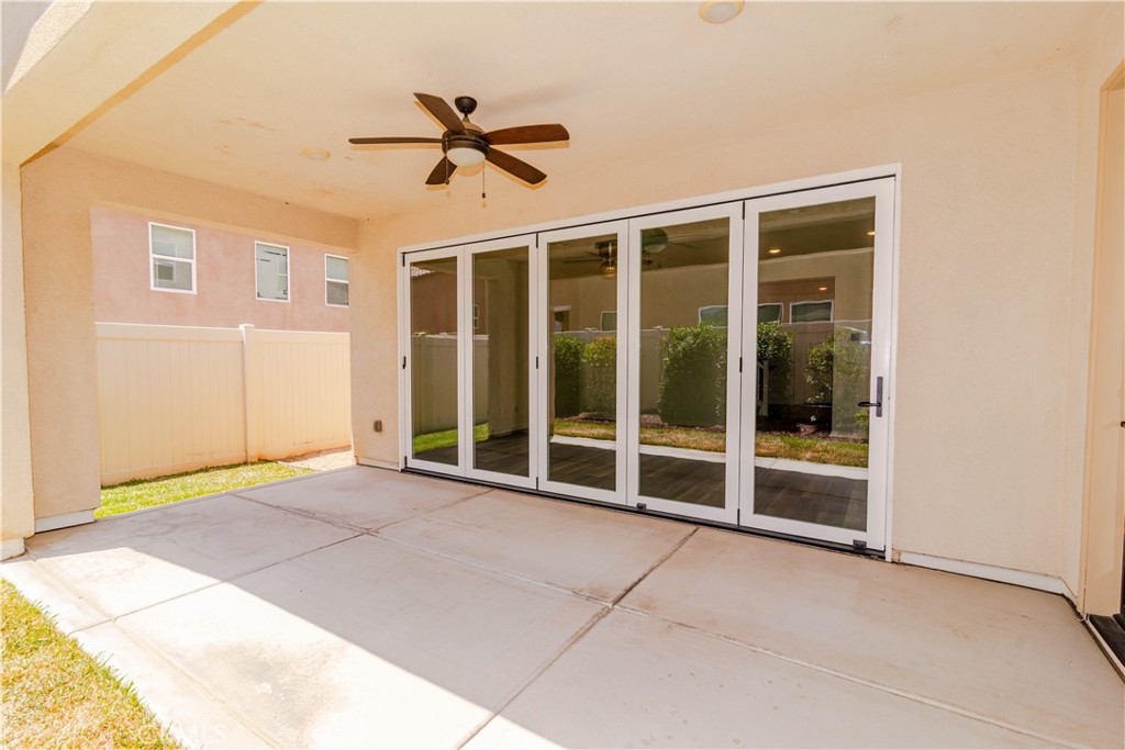 24536 Acadia Drive Corona, CA 92883 - Photo 29 of 40 a view of an empty room with a ceiling fan