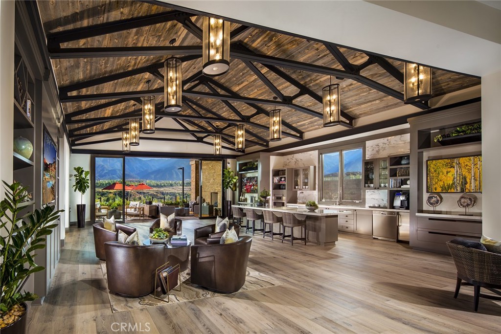 24536 Acadia Drive Corona, CA 92883 - Photo 36 of 40 a living room with furniture and a potted plant